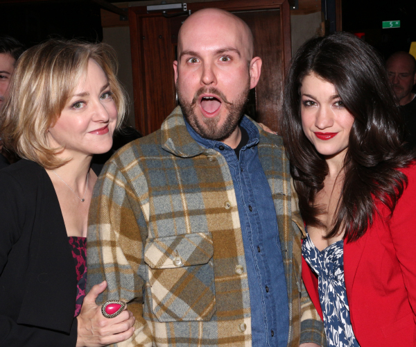 Askins (center) gets close with the ladies of his play, Geneva Carr (left) and Sarah Stiles (right).