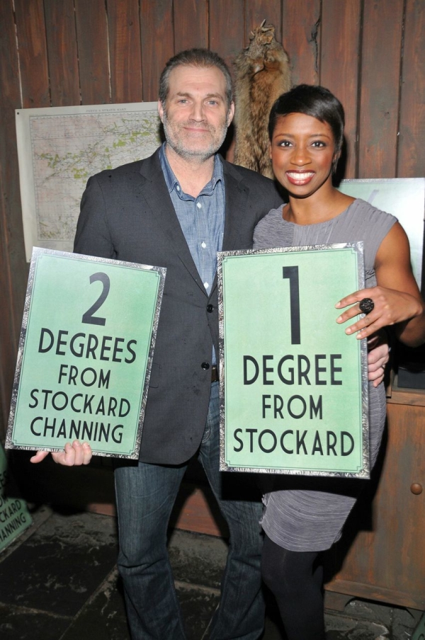 Marc Kudisch and Montego Glover show off their nifty signs at the party.