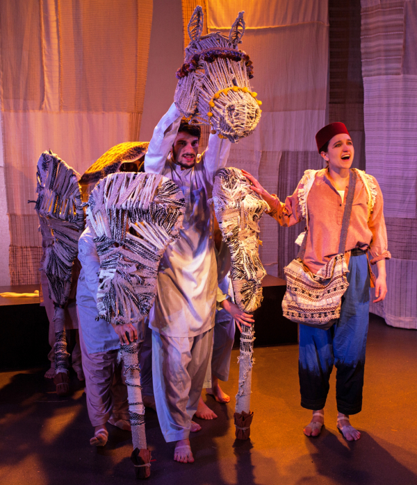 Teri Madonna (right) as Isabelle Eberhardt and her horse, Souf (operated by several cast members), in the new Elizabeth Swados-Erin Courtney musical The Nomad at the Flea Theater.