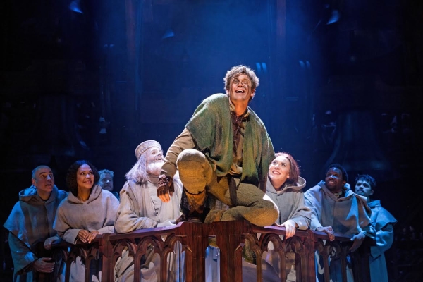 Michael Arden leads the cast as Quasimodo, the titular hunchback of Notre Dame Cathedral.
