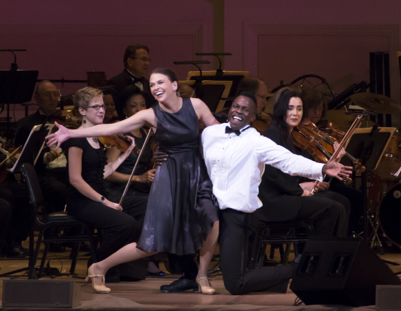 Sutton Foster and Joshua Henry on stage at Carnegie Hall.