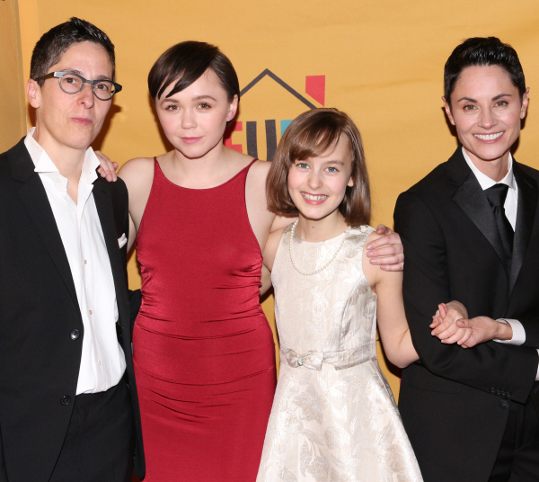 Fun Home creator Alison Bechdel poses with her onstage counterparts, Emily Skeggs, Sydney Lucas, and Beth Malone, at the opening night of the Broadway musical version of her autobiographical graphic novel.