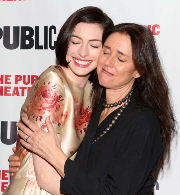 Anne Hathaway and Julie Taymor give each other a hug as they celebrate their work on the Public Theater production of Grounded.