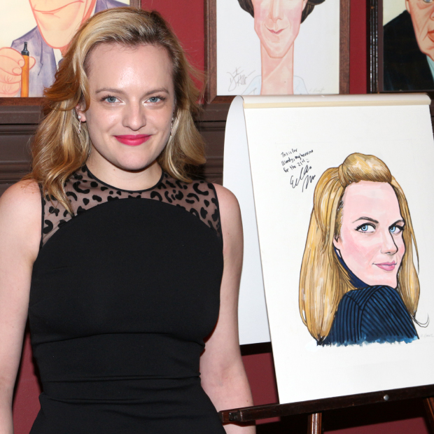 Elisabeth Moss poses with her caricature at Sardi&#39;s.