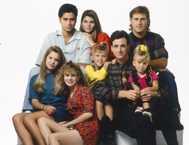A promotional image of the original television cast of Full House.