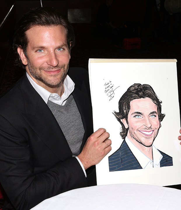 Bradley Cooper with his brand-new Sardi&#39;s caricature.