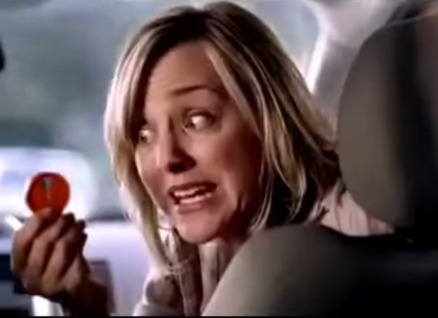 Carr holding a rollover minute in one of her many appearances as the AT&amp;T &quot;mom.&quot;