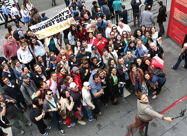 Micah Stock selfies with the crowd in Times Square.