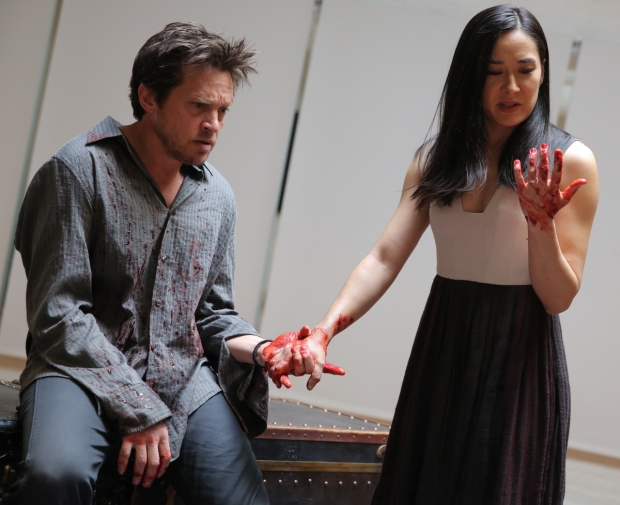 Rob Campbell as Macbeth and Jennifer Ikeda as his wife in the Mobile Shakespeare Unit&#39;s production of Macbeth, directed by Edward Torres, at the Public Theater.
