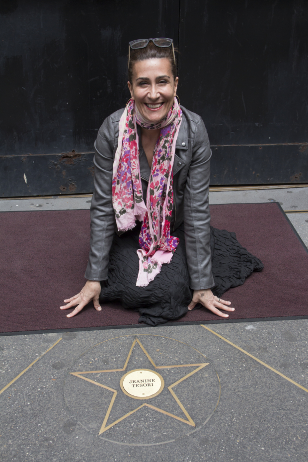 Jeanine Tesori poses with her star on the Playwrights&#39; Sidewalk on Christopher Street.