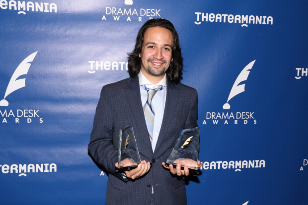 Hamilton&#39;s Lin-Manuel Miranda holding two of his three Drama Desk Awards after the ceremony at Town Hall.