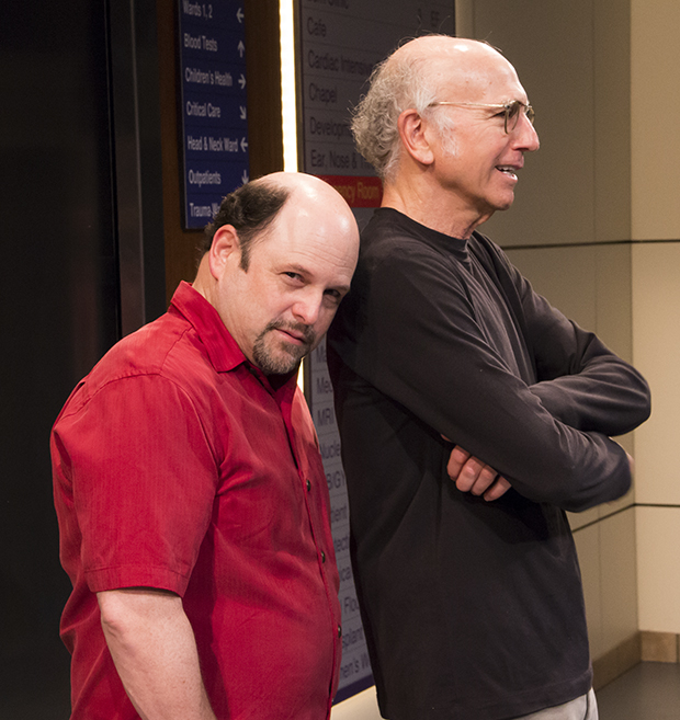 Jason Alexander rests his head on the shoulder of his old pal Larry David on stage at the Cort Theatre.