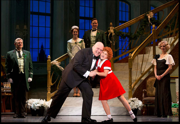 Gilgamesh Taggett as Oliver Warbucks and Issie Swickle as Annie in the new national tour of Annie.