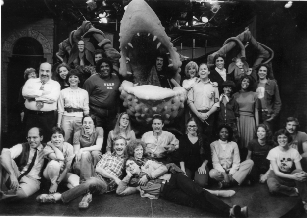 The original Little Shop of Horrors team, with Ellen Greene immediately to the right of the Audrey II puppet.