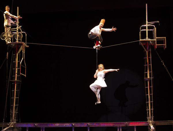 Bello Nock performs on the high wire with Annaliese Nock and Andrew Pratt in Bello Mania, directed by Jennifer Nock, at New Victory Theater.