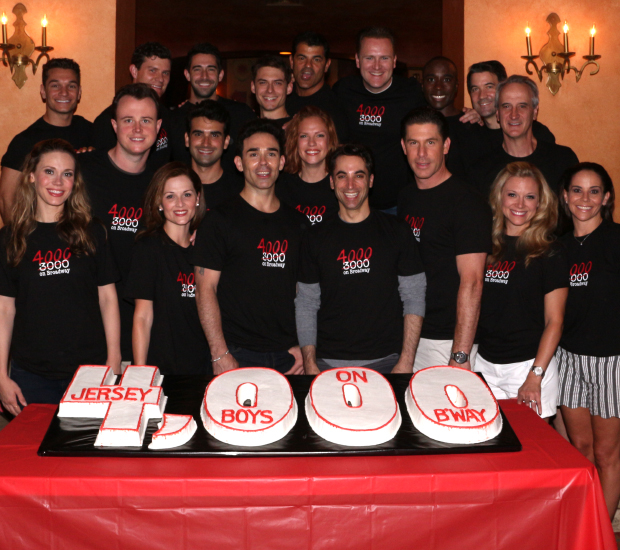 The current cast of Jersey Boys with the 4,000th performance cake.