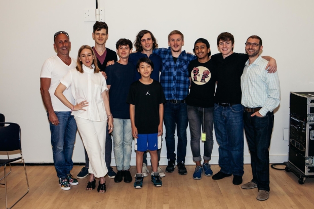 Director Scott Elliott, cast members Emily Cass McDonnell, Peter Mark Kendall, Paul Iacono, Zane Pais, Bradley Fong (front), Sea McHale, Tony Revolori, Jack DiFalco, and New Group Executive Director Adam Bernstein toast the first day of Mercury Fur rehearsal.