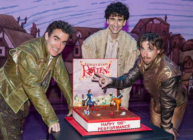 Something Rotten&#39;s leading men Brian d&#39;Arcy James, John Cariani, and Christian Borle pose with their 100th performance cake.