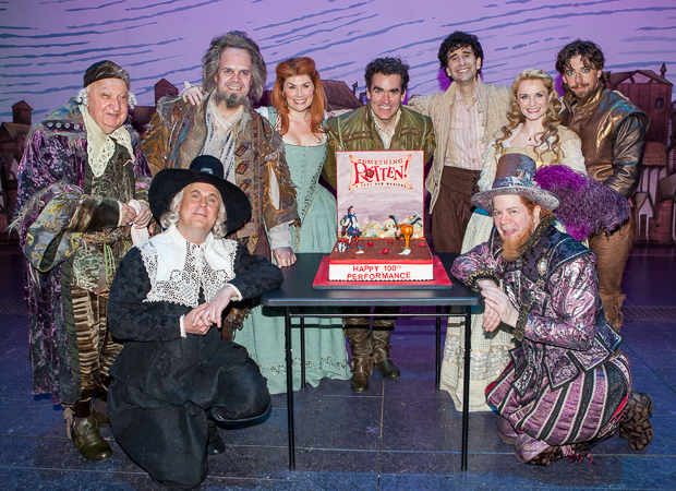Gerry Vichi, Brad Oscar, Heidi Blickenstaff, Brian d&#39;Arcy James, John Cariani, Kate Reinders, Christian Borle, Brooks Ashmanskas, and Peter Bartlett pause for a photo before digging in.