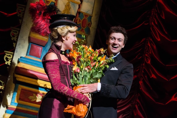 Bryce Pinkham gets a celebratory bouquet of flowers upon his return to the role of Monty Navarro.