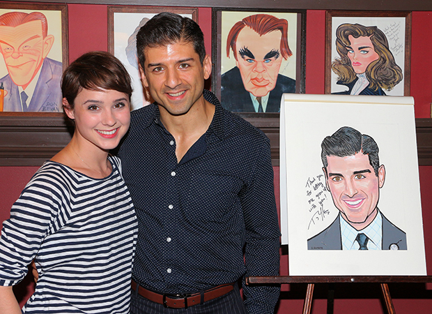Tony Yazbeck and his wife, Katie, pose proudly with his new caricature.