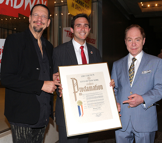 New York City Council Member Ben Kallos presents Penn and Teller with a proclamation from the Big Apple.