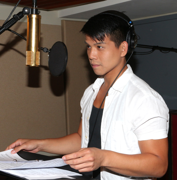 Telly Leung records a track for his new album at Yellow Sound Studios.