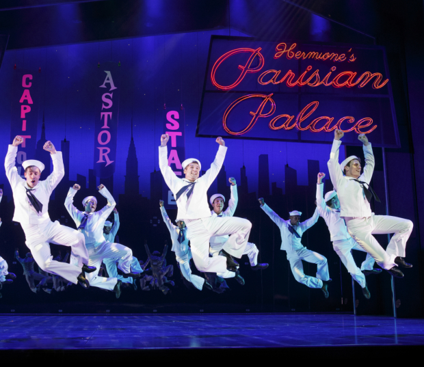 Clyde Alves, Tony Yazbeck, and Jay Armstrong Johnson kick up their heels in a high-flying moment from On the Town.