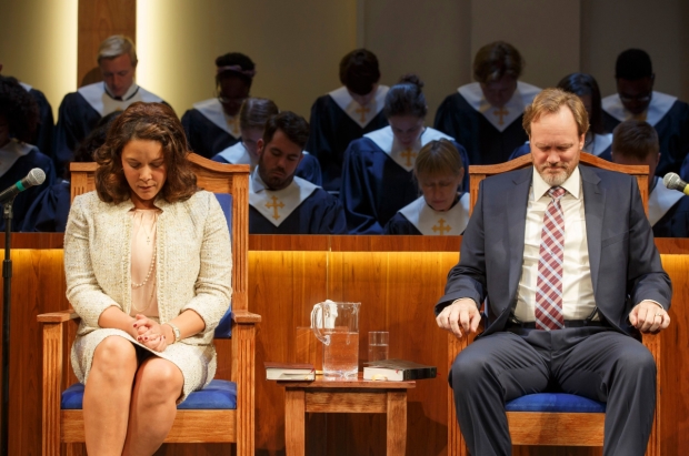Linda Powell and Andrew Garman bow their heads in a scene from The Christians.