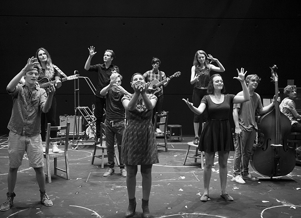 Krysta Rodriguez (center) and the cast of Spring Awakening performs The Song of Purple Summer in their rehearsal room.