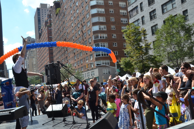 The Amazing Max hosts the annual TheaterMania Street Fair in 2014.