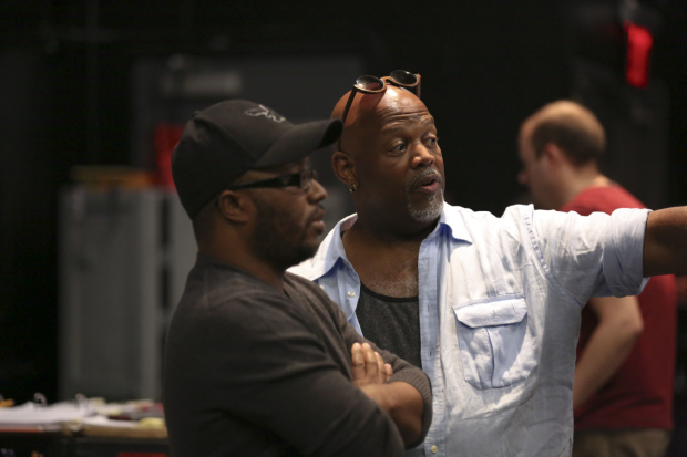 Playwright Robert O'Hara and director Kent Gash discuss a moment in rehearsal.