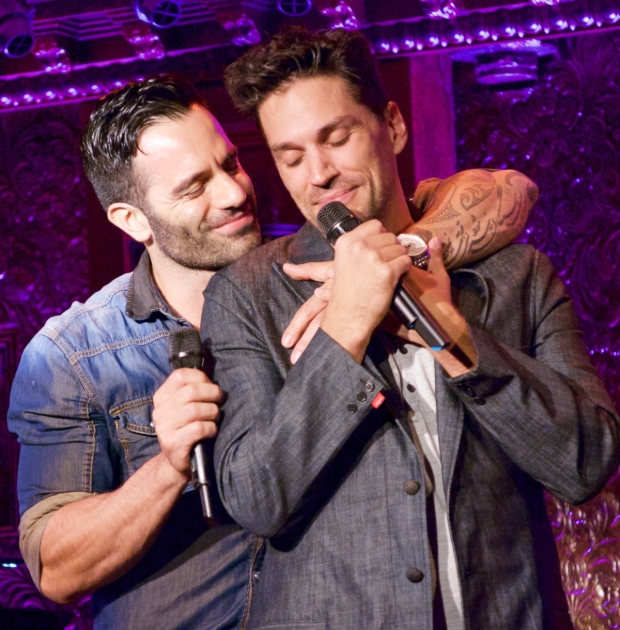 Former Les Misérables costars Ramin Karimloo and Will Swenson share a tender moment during Swenson&#39;s concert at Feinstein&#39;s/54 Below.