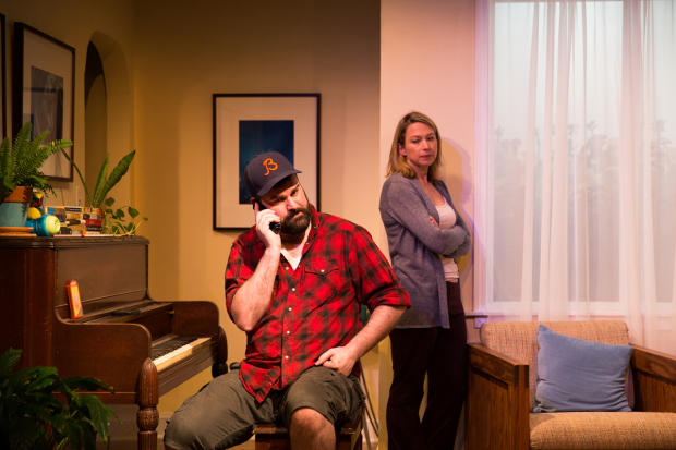 Brad Akin joins Kendra Thulin in a scene from The Cheats. 