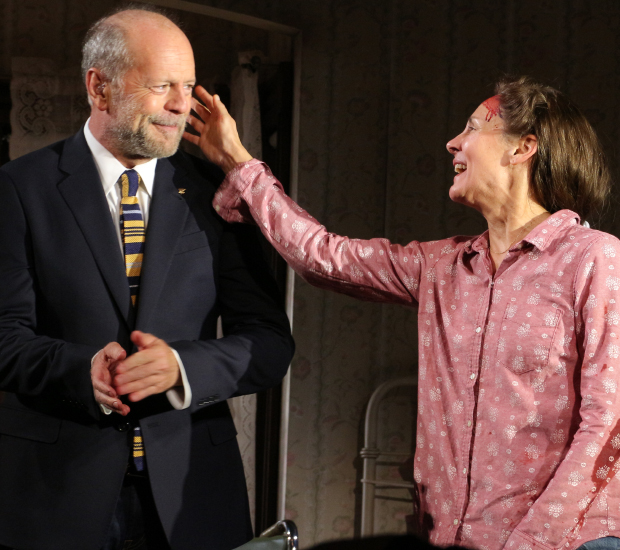 Bruce Willis and Laurie Metcalf share a tender moment as they take their curtain call following the first preview of Misery.
