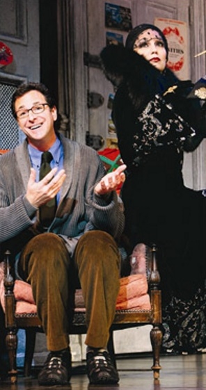 Bob Saget as Man in Chair and Beth Leavel as the title character in the Broadway musical The Drowsy Chaperone.