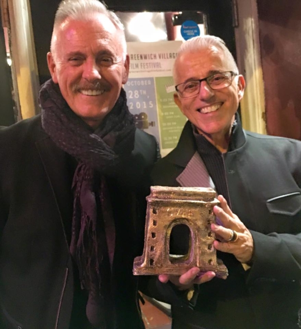 Greenwich Village: A World Apart producers Richard Eric Weigle and Michael Anastacio holding their prize at the first-ever Greenwich Village Film Festival. 