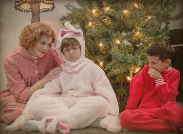Nate Becker (center) stars as Ralphie, with Linda Gillum as Mother and Nolan Moss as Randy, in A Christmas Story at the Theater at the Center.
