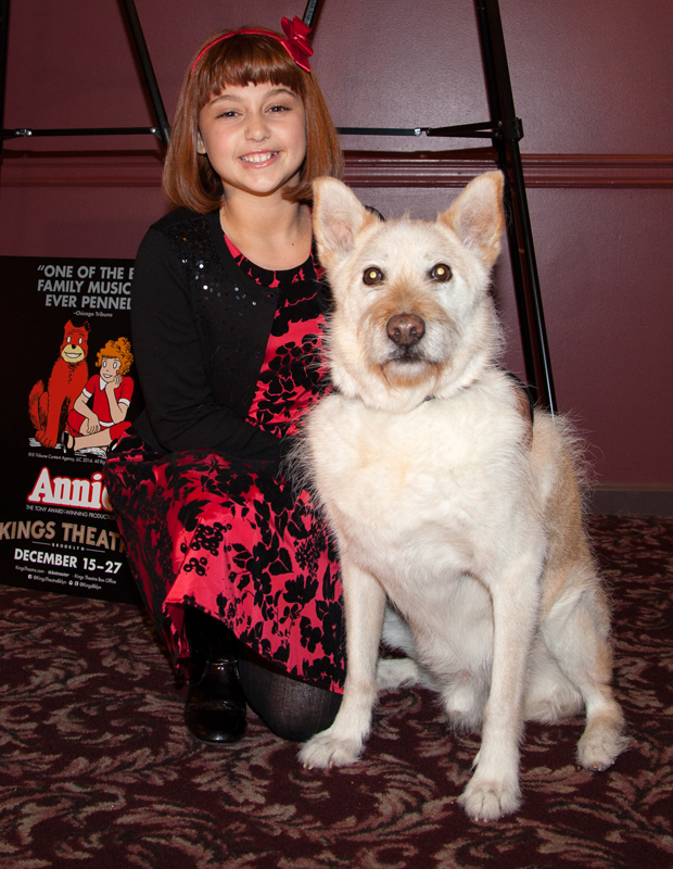 Annie star Issie Swickle poses with Annie&#39;s lovable dog, Sandy.