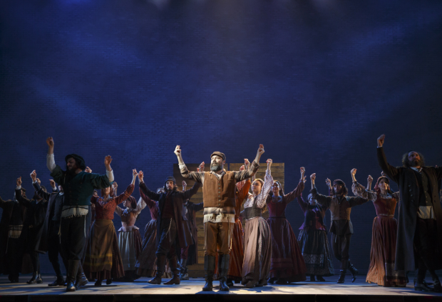 Danny Burstein leads the cast of Fiddler on the Roof, directed by Bartlett Sher, at the Broadway Theatre.