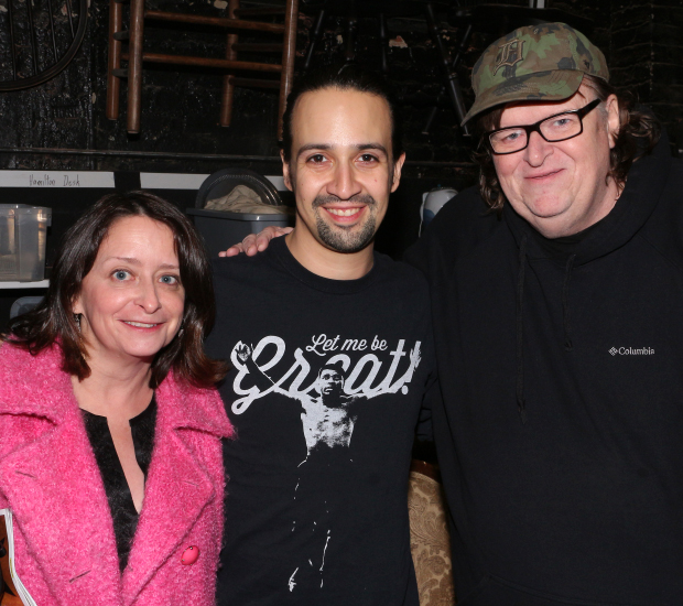 Lin-Manuel Miranda visits with Rachel Dratch and Michael Moore following a recent performance of Hamilton.
