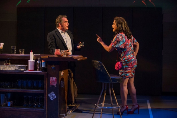 Tom Irwin (Bill Pulver) and Esteban Andres Cruz (Woman in Bar) in Steppenwolf Theatre Company's production of Domesticated, written and directed by Bruce Norris.