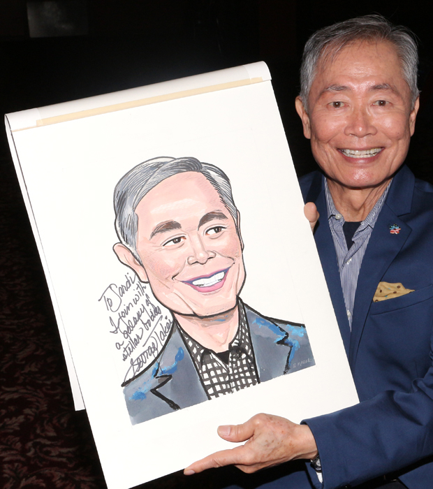 George Takei beams with pride as he  with his brand new Sardi&#39;s portrait.