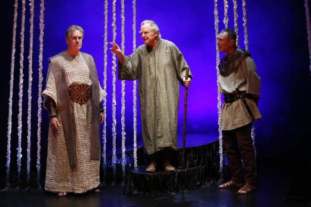 Creon (Paul O'Brien) and the Guard (Colin Lane) listen as Tiresias (Robert Langdon Lloyd, center) delivers a prophecy of impending doom.