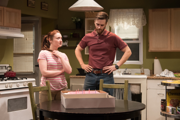 Amber (Vanessa Vache) and Jim (Alex Grubbs) survey a smashed birthday cake in Utility.