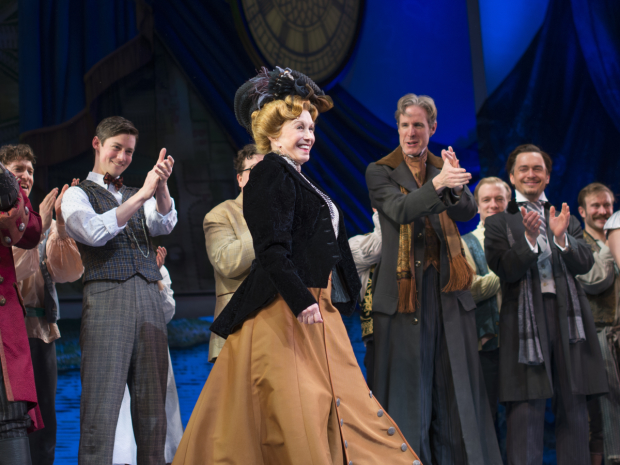 The cast of Finding Neverland applauds Duncan on her opening night with the company.