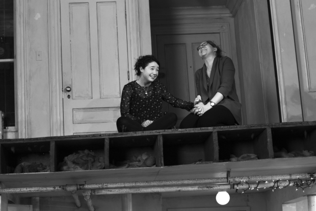 Sisters Brigid (Sarah Steele) and Aimee (Cassie Beck) share a moment on the second floor of David Zinn&#39;s duplex set in Stephen Karam&#39;s The Humans.