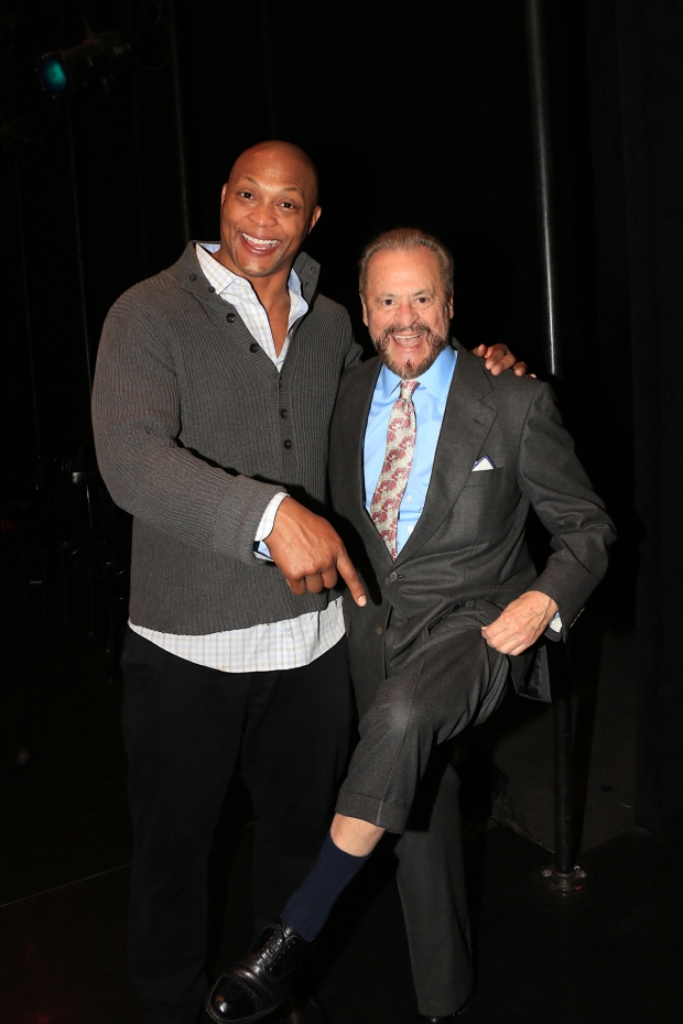 Chicago producer Barry Weissler kicks up his heels with leading man Eddie George.