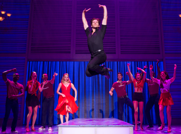 Christopher Tierney leads the cast of Dirty Dancing on stage.