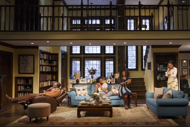 Donald (Harold Surratt), Nyasha (Ito Aghayere), Tendi (Roslyn Ruff), and Marvelous (Tamara Tunie) lounge in their cozy home (designed by Clint Ramos) in Familiar.
